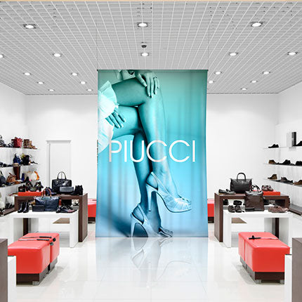 Full color canvas fabric banner hanging in shoe store