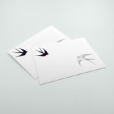 A7 envelopes printed full color with flying bird in front.